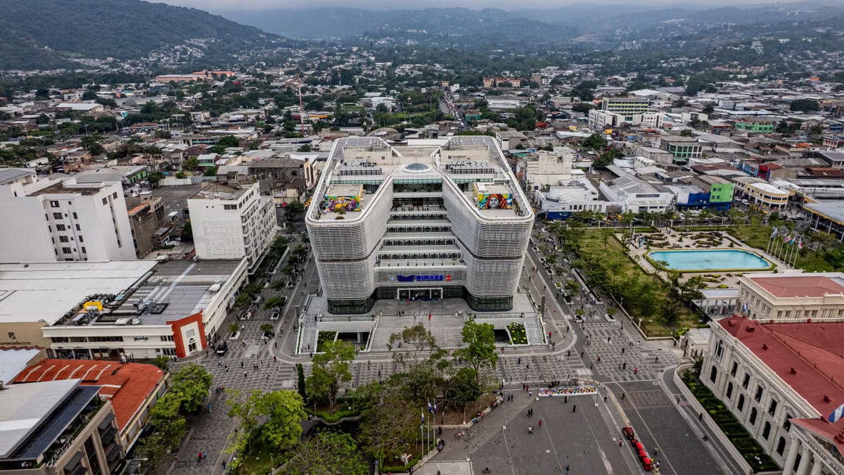 A stunning aerial view of downtown San Salvador's vibrant plaza and modern architecture.